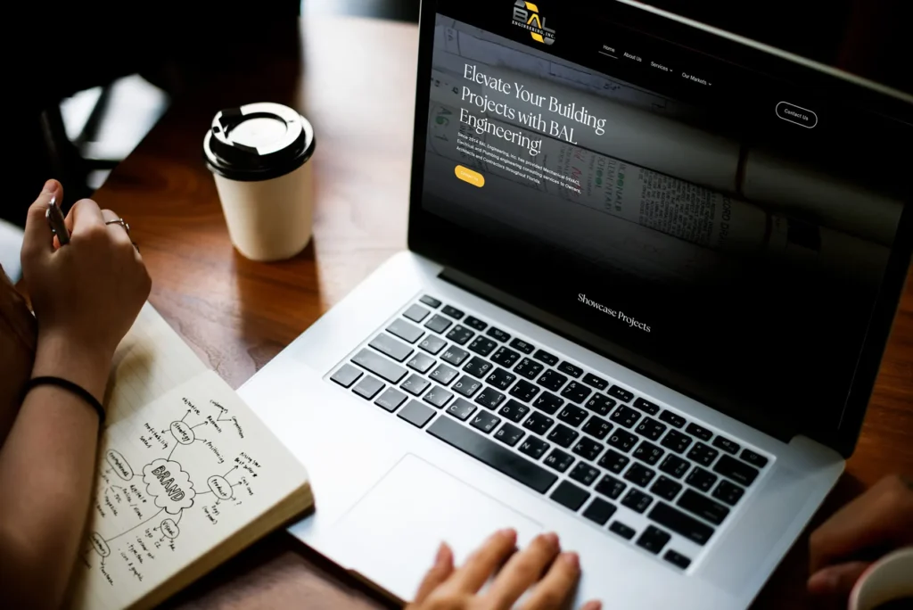 Professional reviewing engineering website while planning brand strategy and project concepts