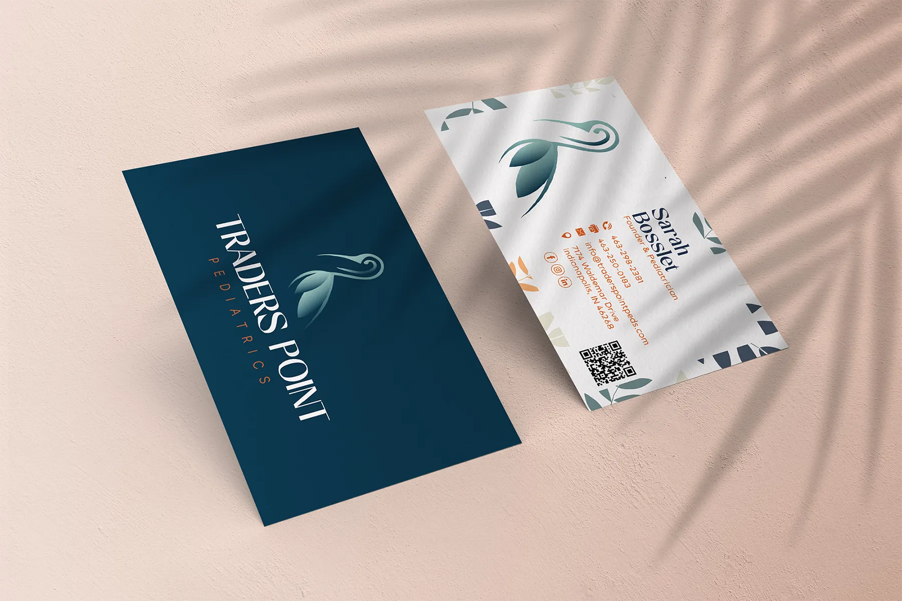 Traders Point Pediatrics business card design showing front and back with logo and contact details