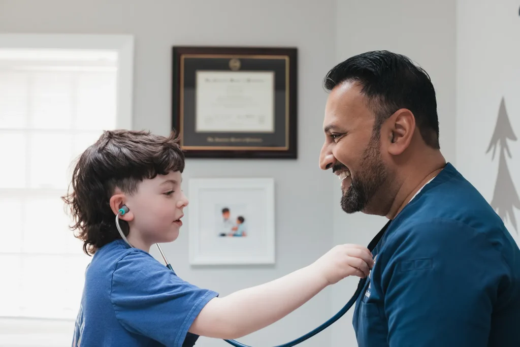 Dr Gupta with a client Dr Gupta with a client